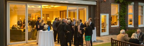 Guests enjoying an event at the Royal Sydney Golf Club in the evening