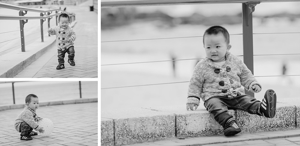 1 year old Asian boy playing at Coogee Beach Sydney