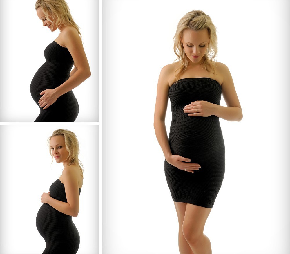 Pregnant blonde woman in black dress smiling in Sydney studio