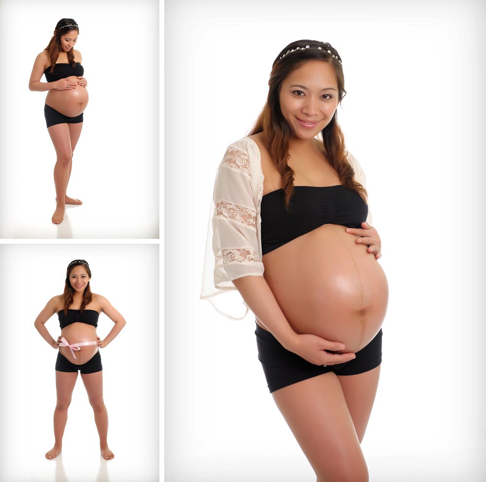 Pregnant woman in black tube and shorts in studio