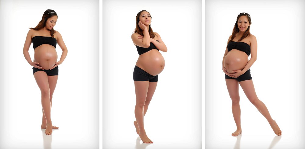 Pregnant woman in black tube and shorts in studio
