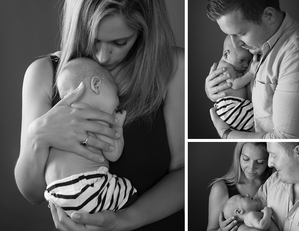 Caucasian couple with newborn baby boy in striped shorts in Coogee studio