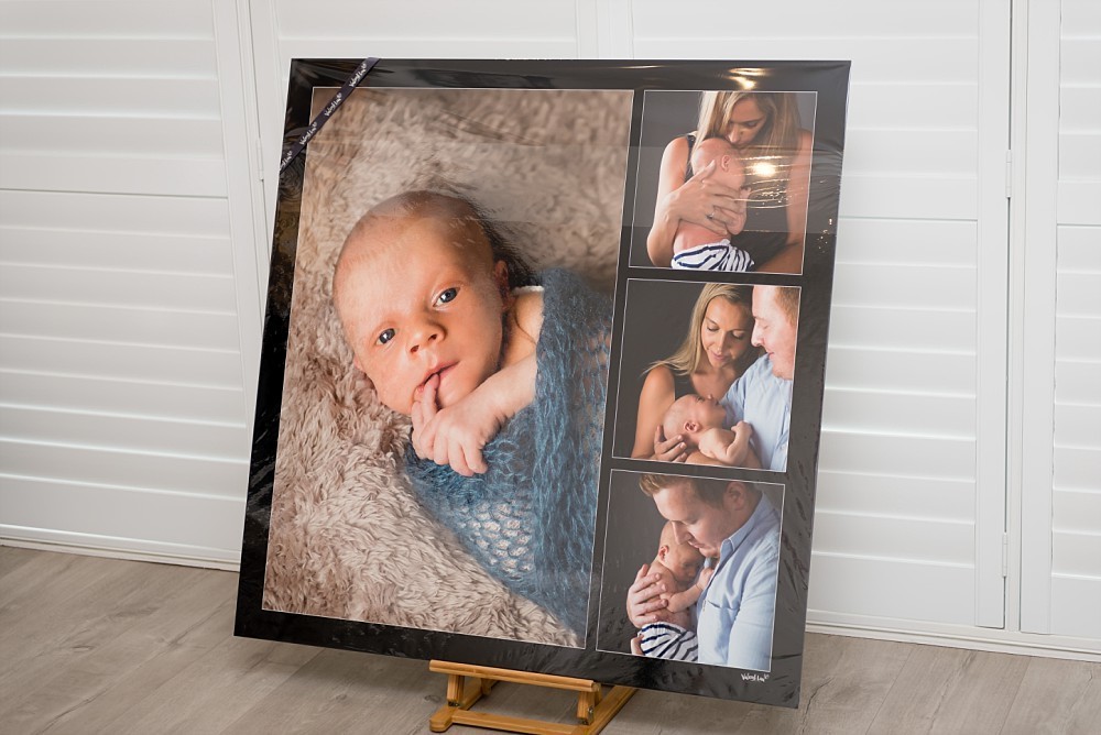 Metal artwork of newborn baby and family in Sydney photography studio